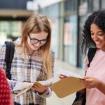 GCSE Results Day - Teenagers Opening Their Results