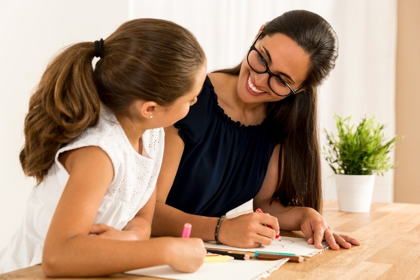 Help with Homework - Adult Helping the Child with Homework