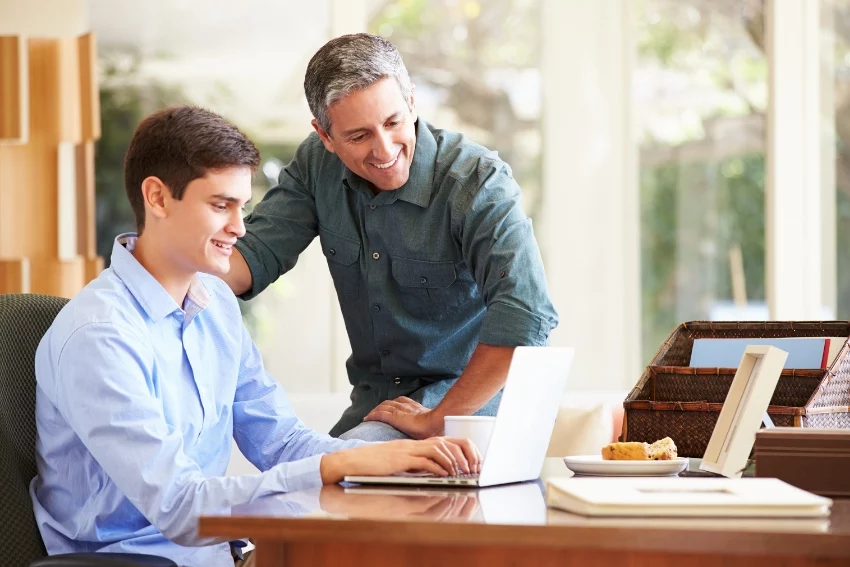 Parent and His Son Checking GCSE Results Day