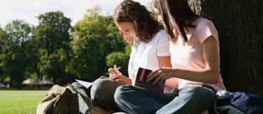 GCSE and A-level Student Revising Together in Summer