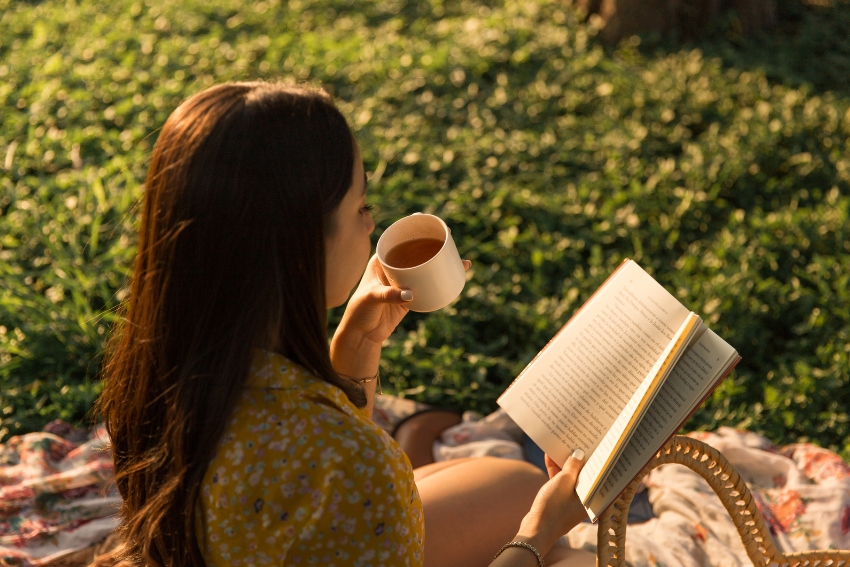 A GCSE Student Reading on a Picnic