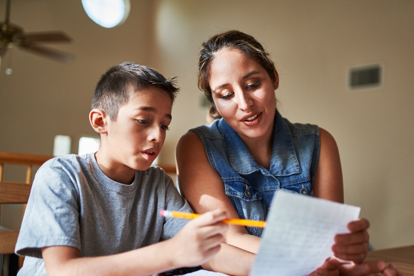 Parent Helping a Child Revise for GCSEs